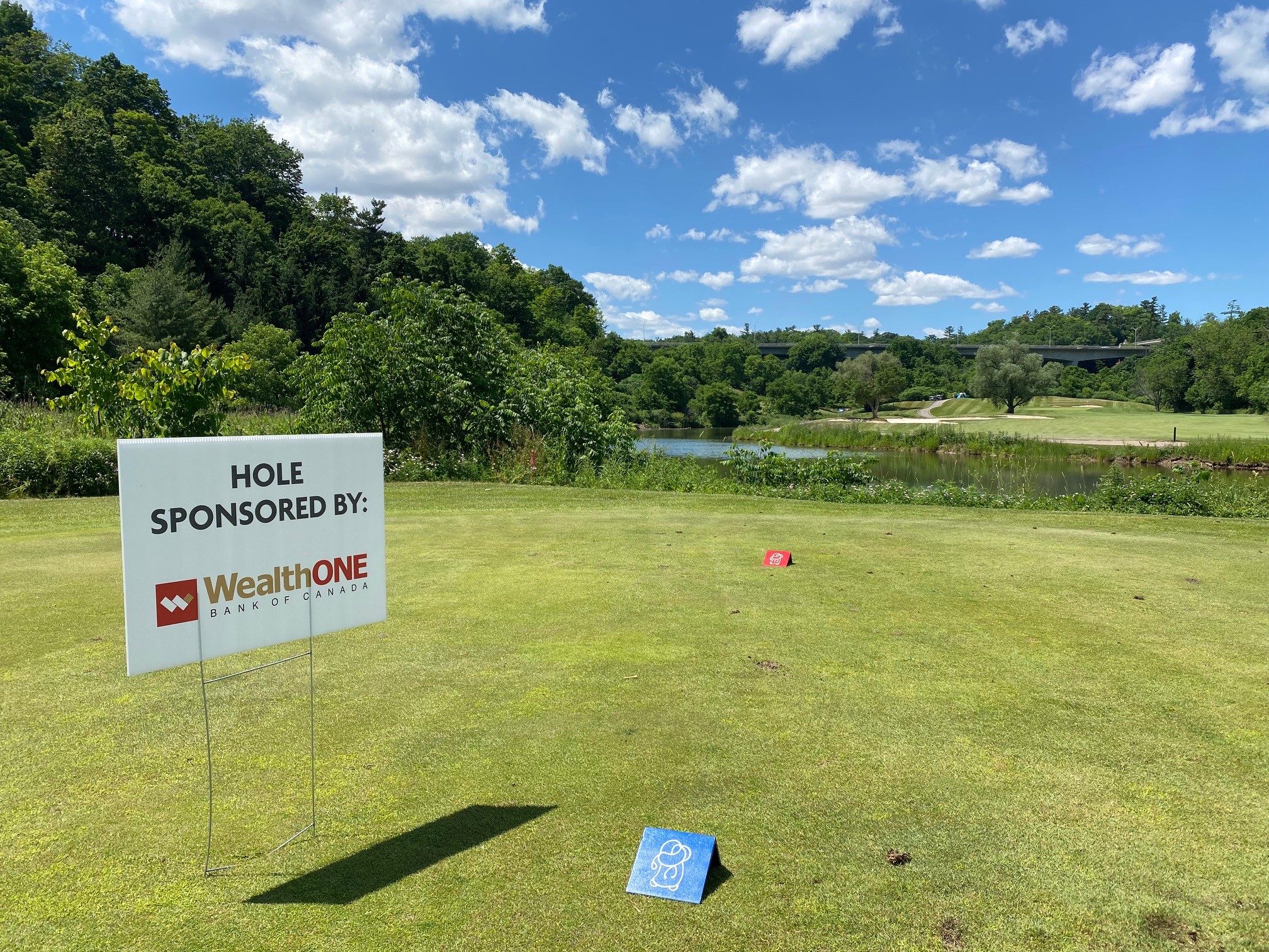 WealthONE logo at the sponsored hole 